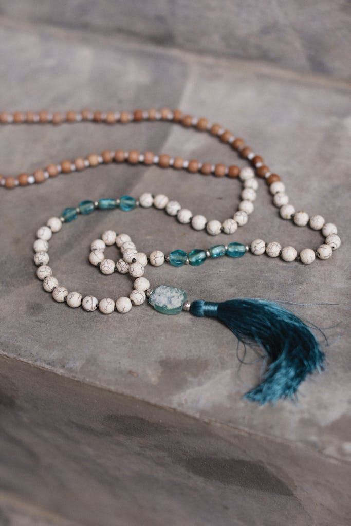 Photo of a Necklace with a Blue Tassel